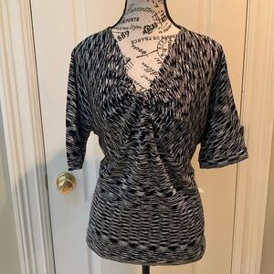 Jones New York black and white short sleeve top.